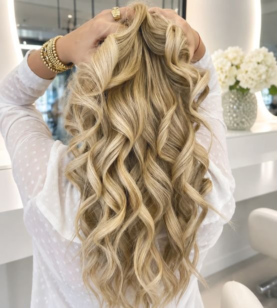 Curly long blond hair by Annette Hunt